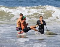 Attack victim being carried through surf